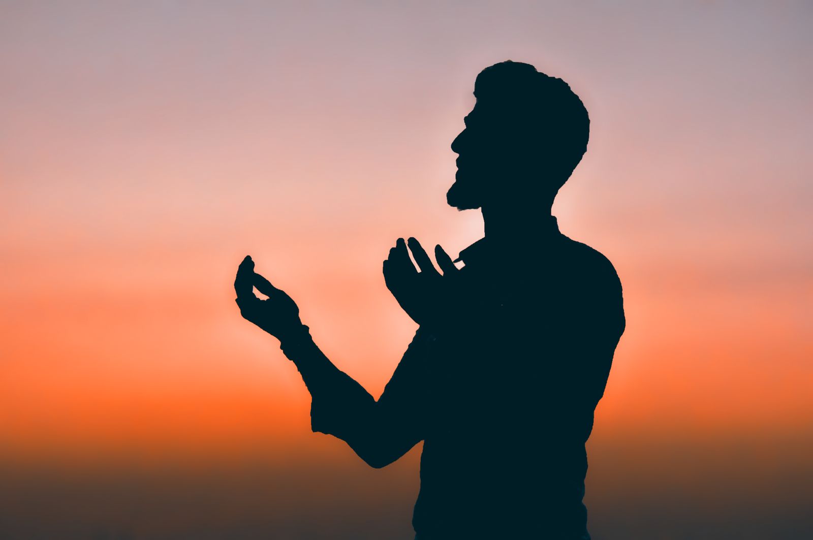 Line-art of a man sitting still in prayer, hands open, with subtle rays of light filtering down — the posture of a man meeting his own weakness and meeting God there.